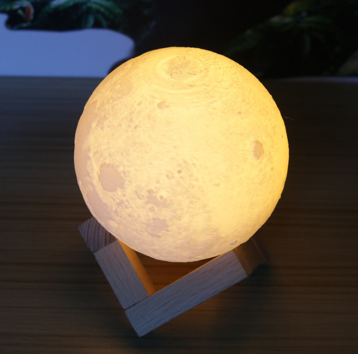 Luna tranquil moon lamp on wooden stand